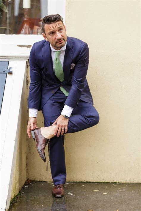 green tie blue suit